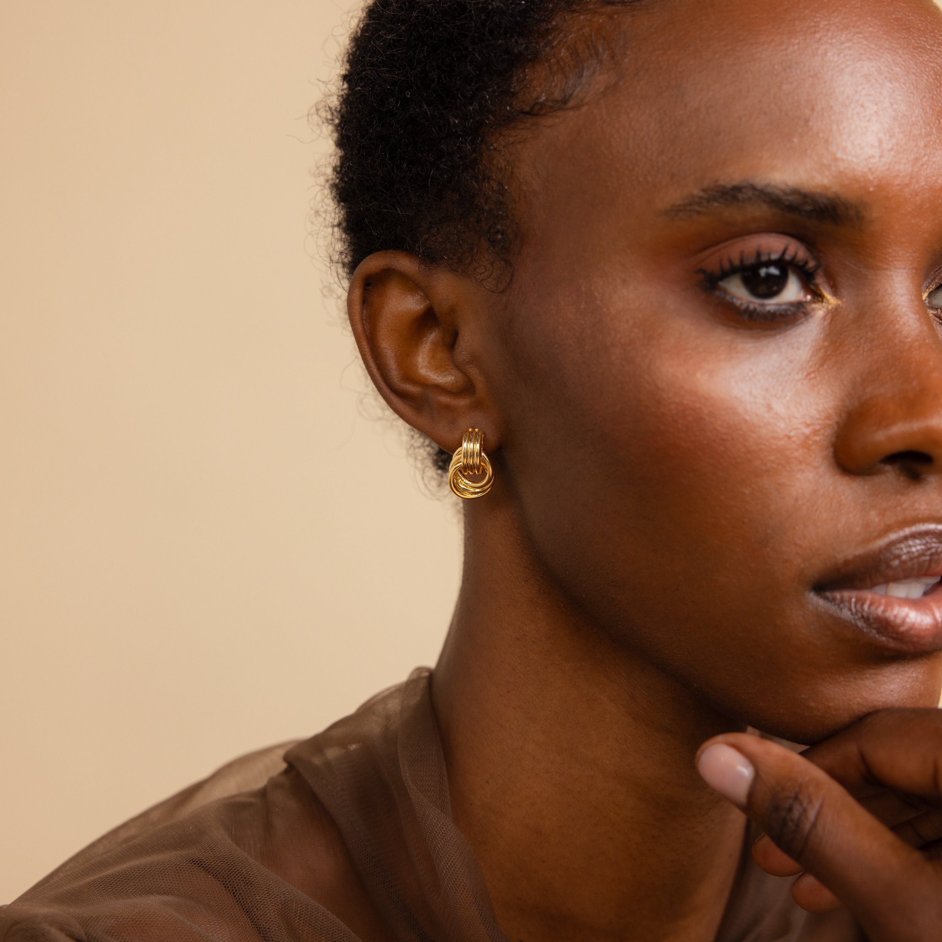 Knot earrings made of EVA foam.