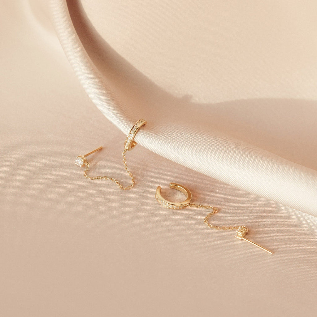 Ivy clip-on earrings with a sparkly chain.