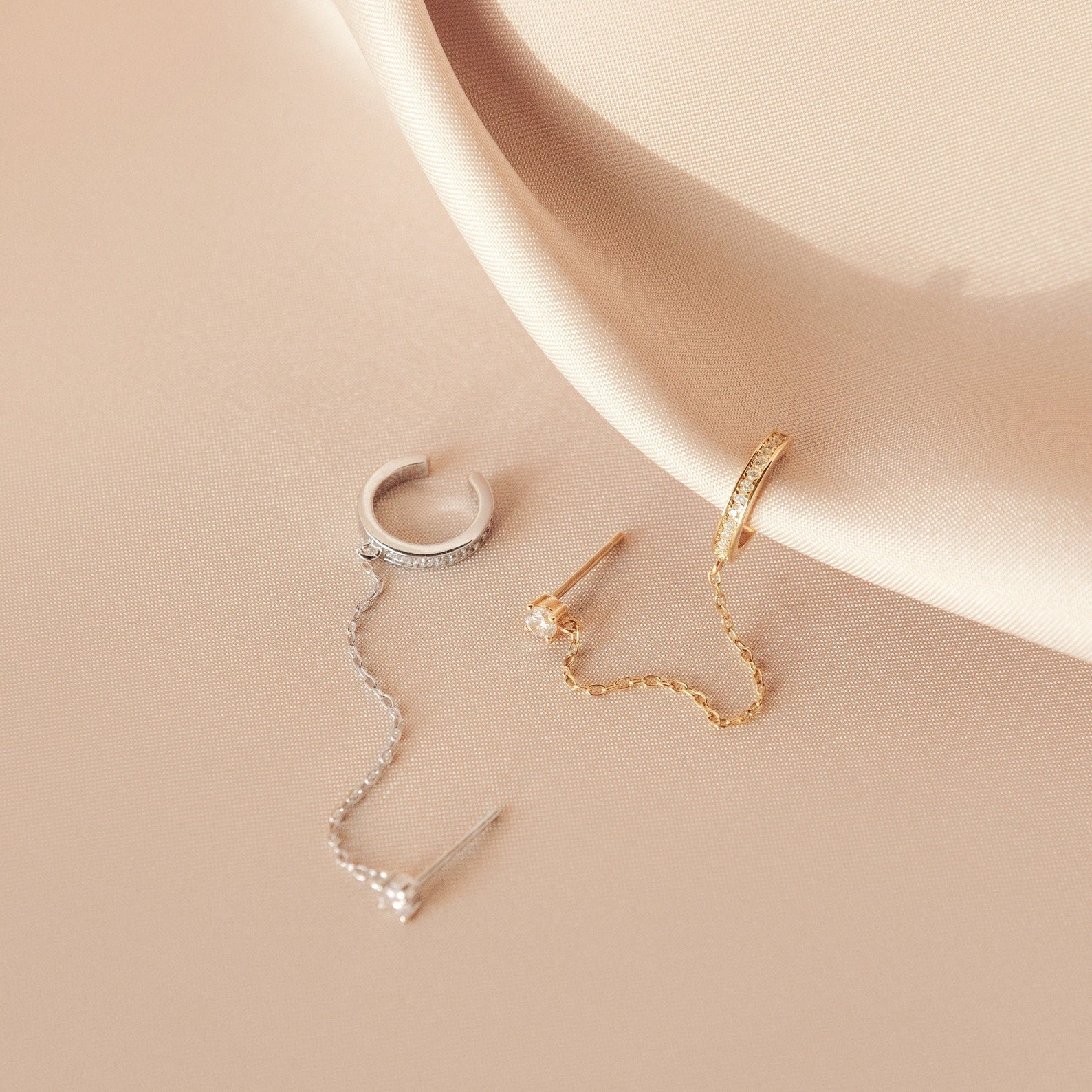 Ivy clip-on earrings with a sparkly chain.