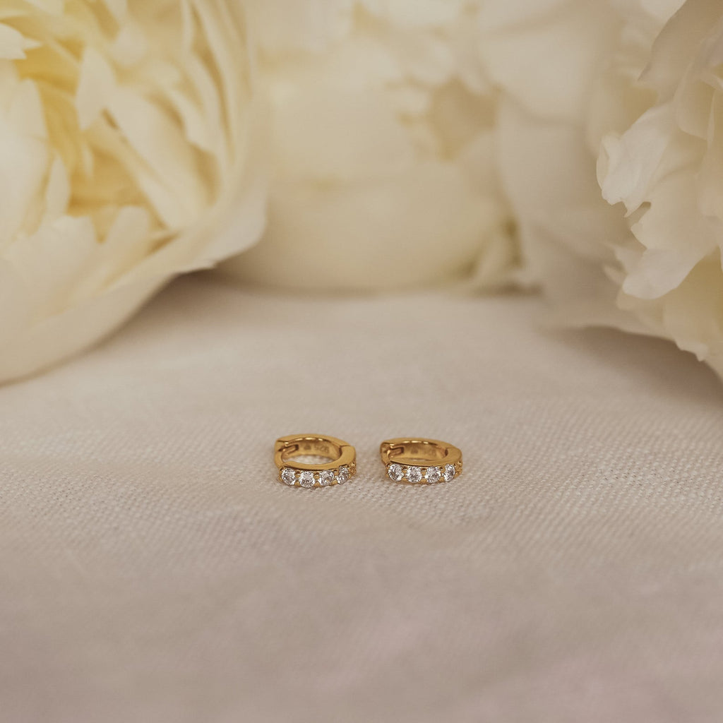 Leah Diamond earrings in 18k gold.