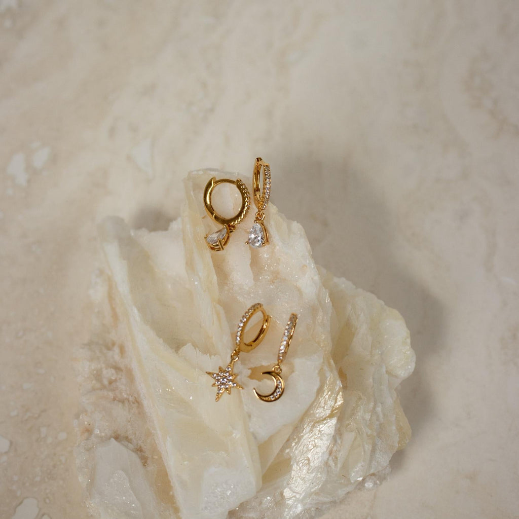 Stunning hoop earrings studded with diamonds.