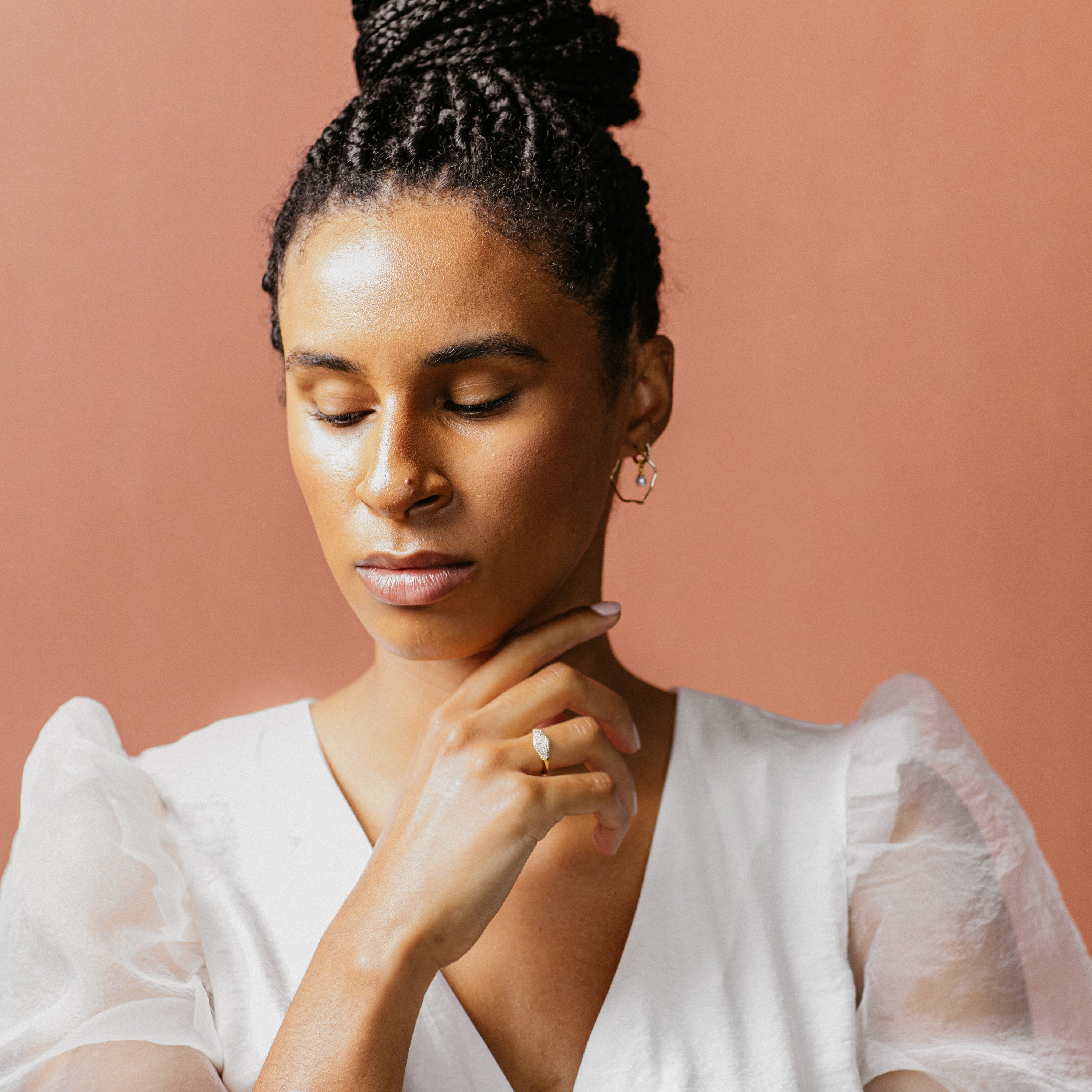 Ring with a studded surface