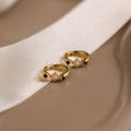 Vienna colored earrings in 18k gold.