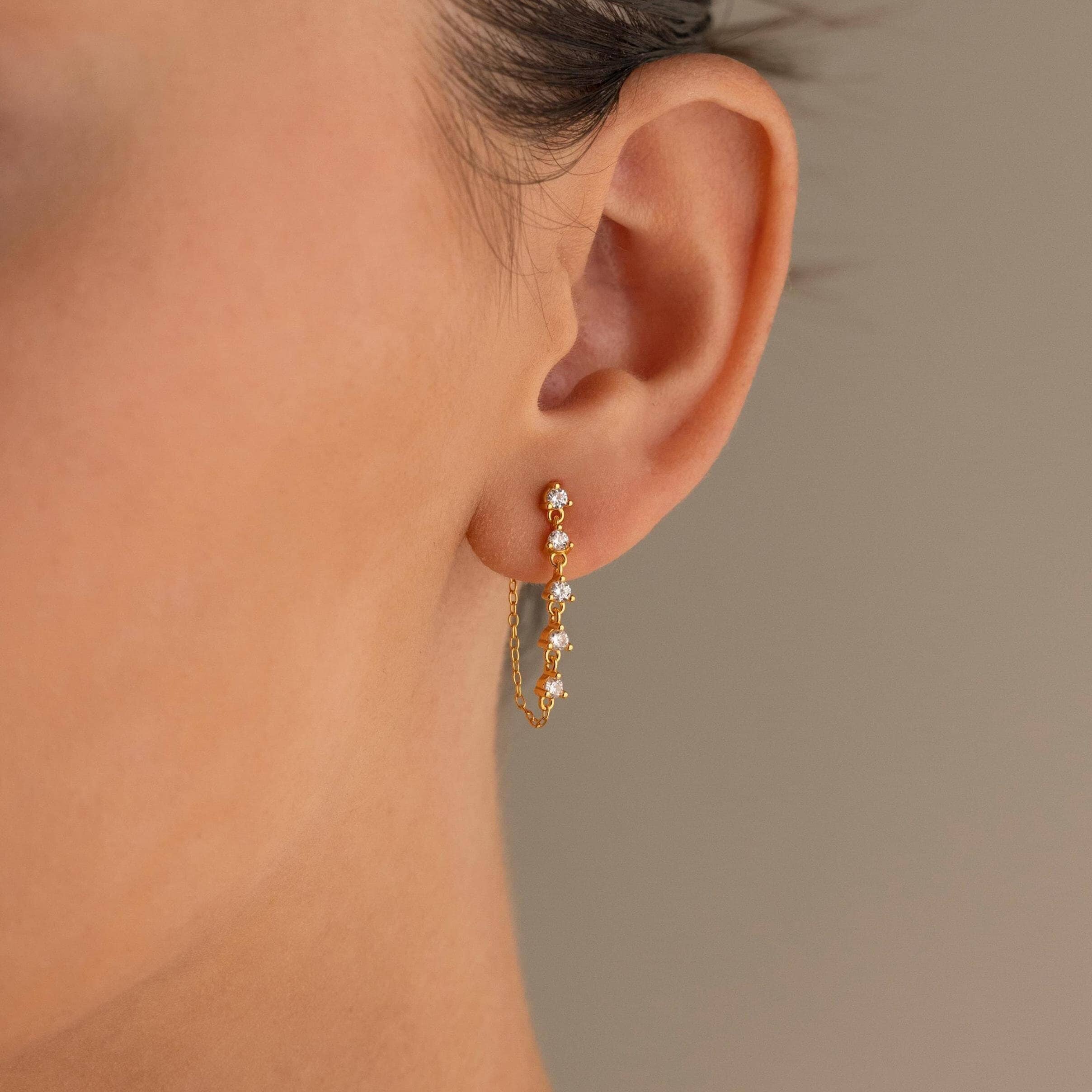 Zara earrings with chain in 18k gold.