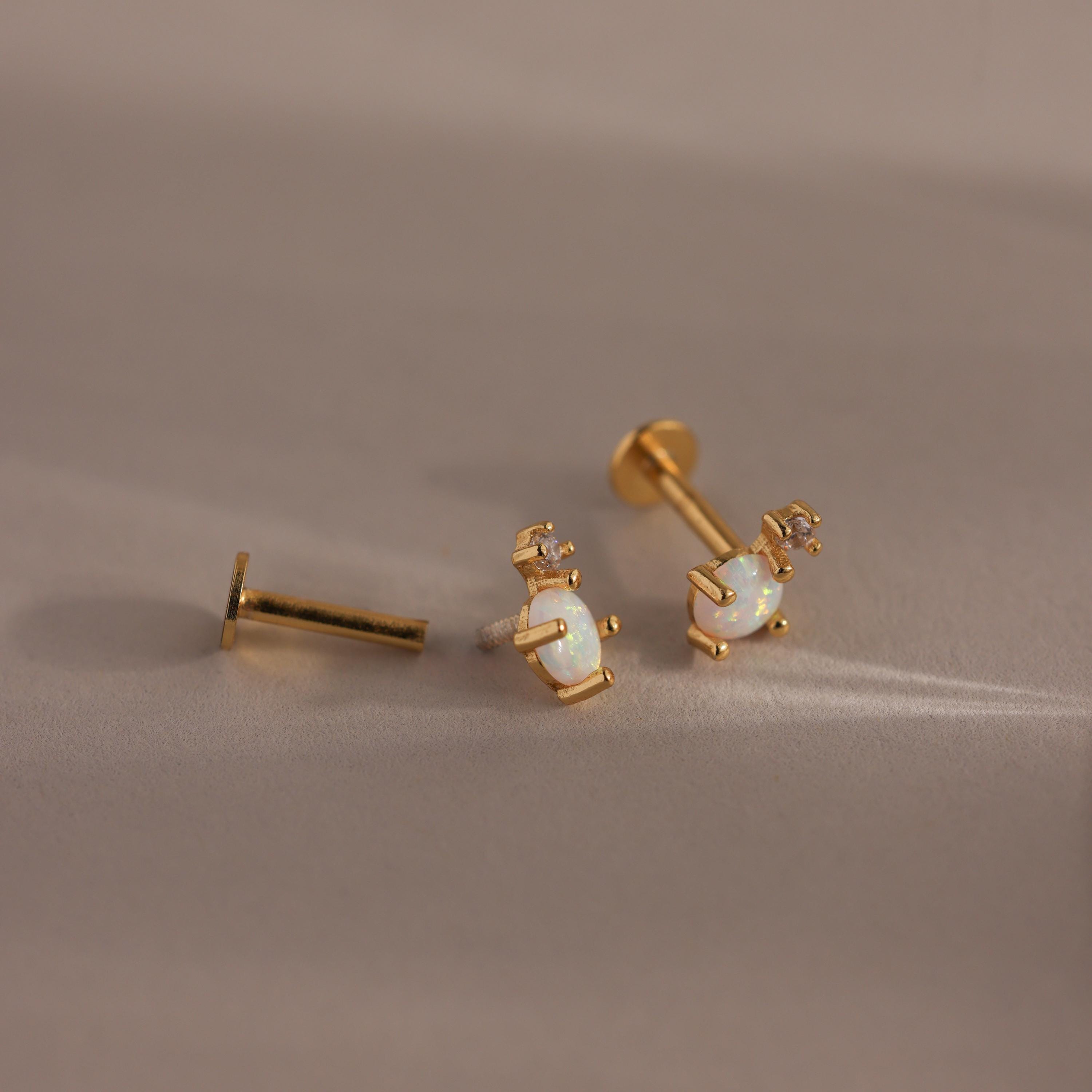 Harmony earrings with opal and diamond.
